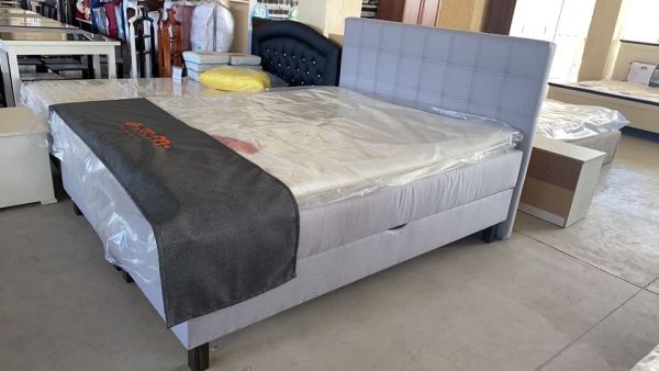 Стильне ліжко Логан